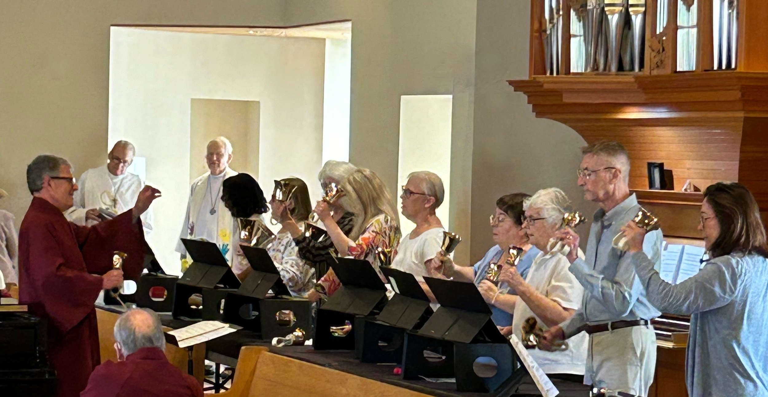 St. Alban’s handbell choir making music together.